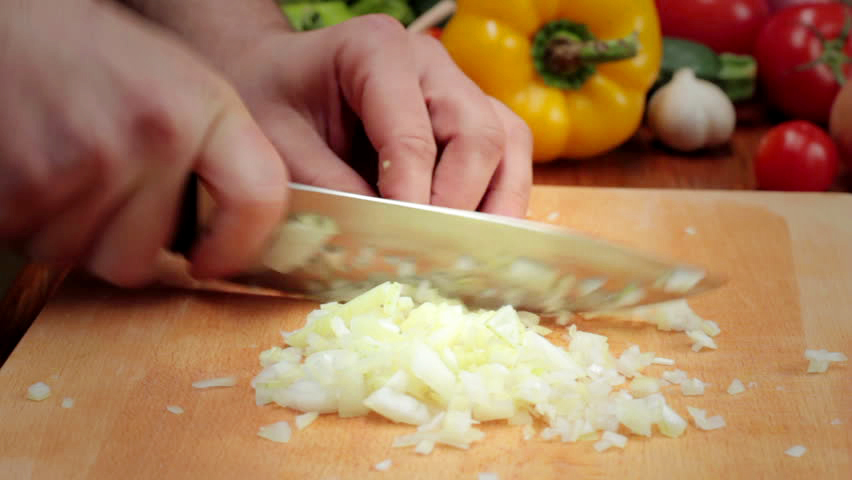 Chopping onions for gumbo recipe